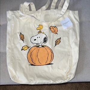 American Eagle Outfitters Cream Tote with Snoopy and Pumpkin Design